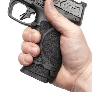 MP compact pistol in hand with 17 round magazine and sleeve